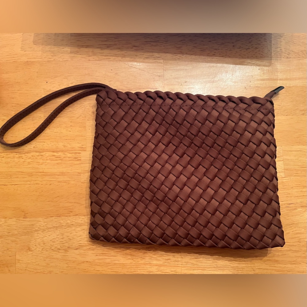 Bag & Bougie NWT brown woven cosmetic bag.